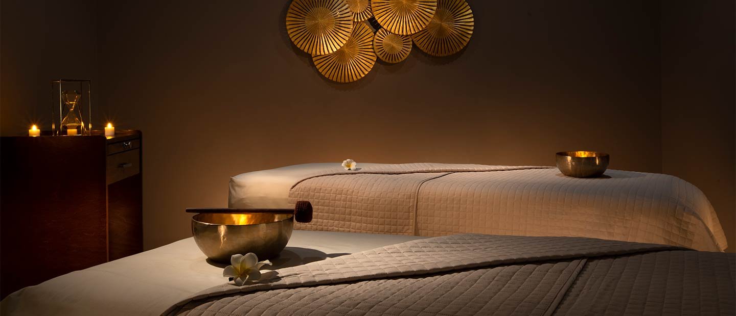 Relaxing Spa Setting with candles and towels